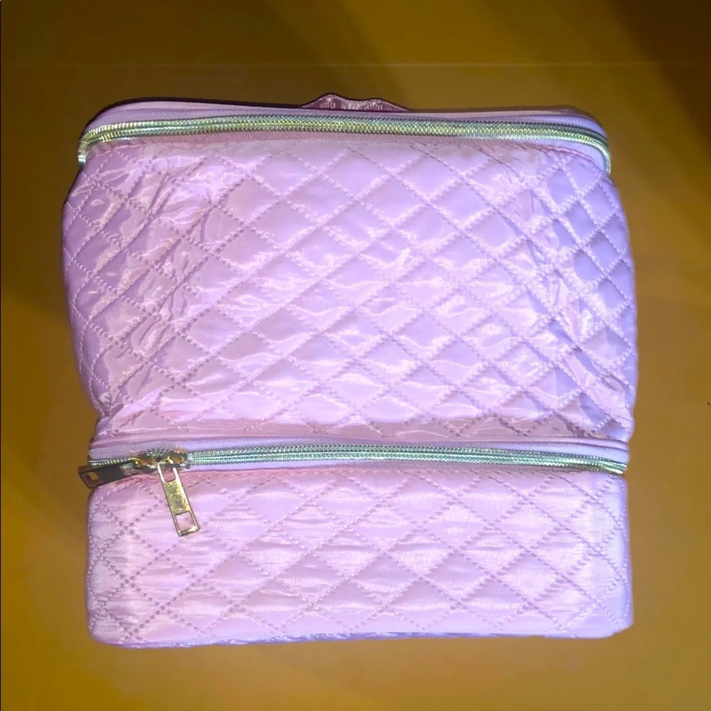 Pink quilted manicure and cosmetics bag